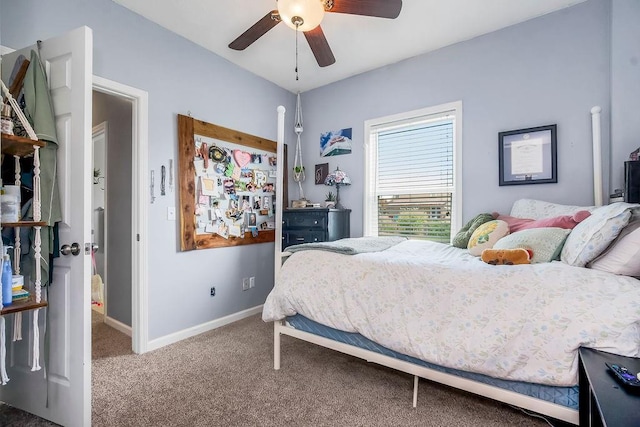1912 Sequoia Dr, Raymore, MO 64083 - carpeted bedroom with baseboards and ceiling fan