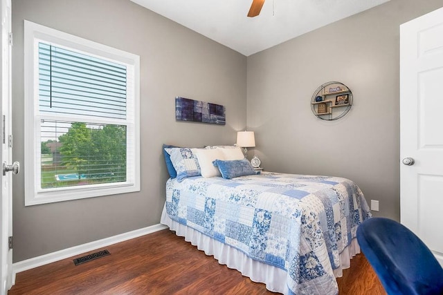 1912 Sequoia Dr, Raymore, MO 64083 - bedroom featuring dark wood-style flooring and ceiling fan