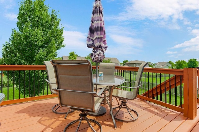 1912 Sequoia Dr, Raymore, MO 64083 - deck featuring outdoor dining area