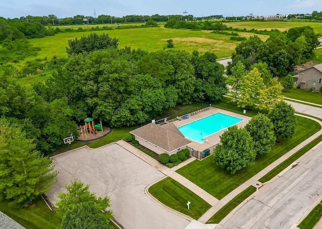 1912 Sequoia Dr, Raymore, MO 64083 - drone / aerial view of a pool