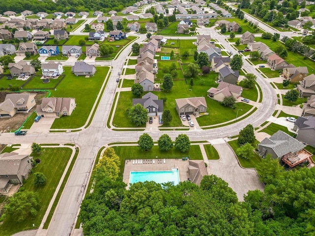1912 Sequoia Dr, Raymore, MO 64083 - aerial view of residential area featuring a pool area