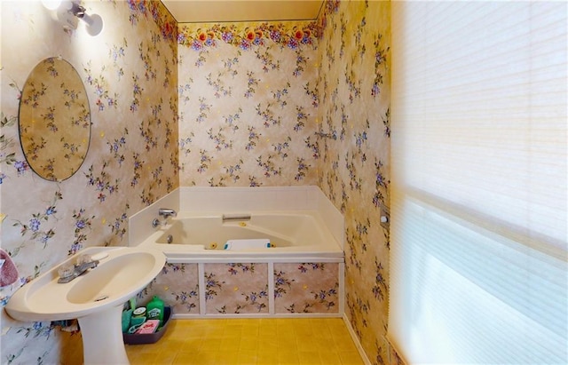 4598 N Avilla St, Reeds, MO 64859 - bathroom with wallpapered walls and a jetted tub