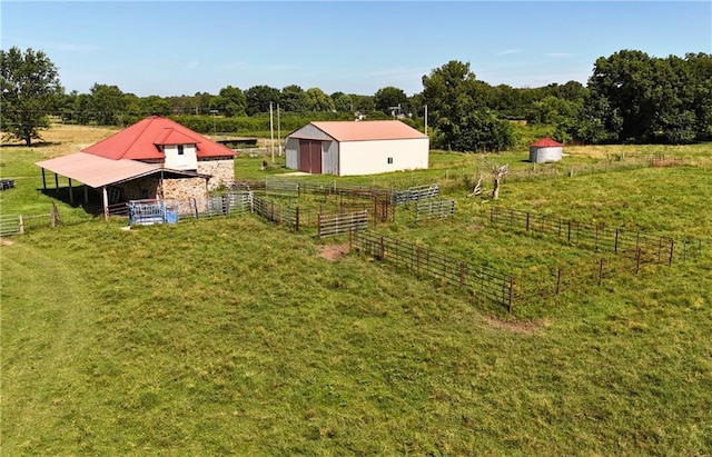 4598 N Avilla St, Reeds, MO 64859 - view of yard featuring an outbuilding, an exterior structure, a view of countryside, and a pole building