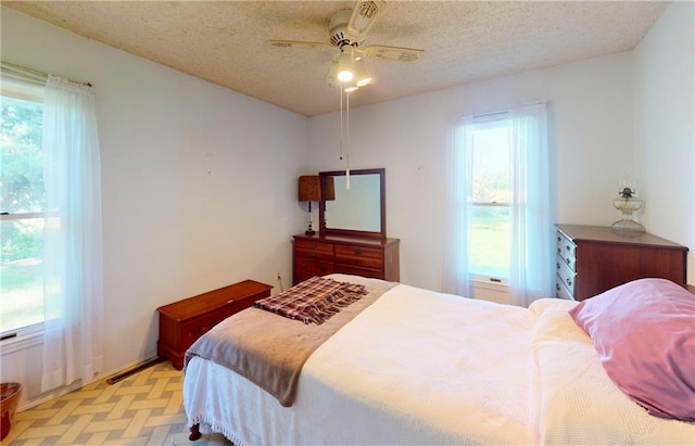 4598 N Avilla St, Reeds, MO 64859 - bedroom featuring a textured ceiling and ceiling fan