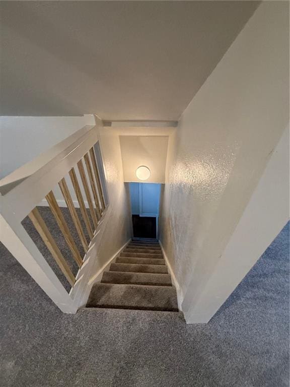 2010 N 2nd St, Saint Joseph, MO 64505 - staircase with carpet flooring