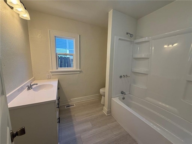 2010 N 2nd St, Saint Joseph, MO 64505 - full bath featuring vanity, shower / washtub combination, and a textured wall