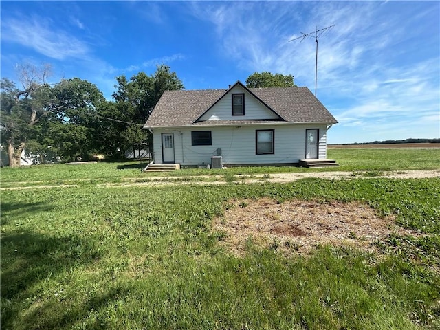 895 Cloud Rd, Salina, KS 67436 - back of house featuring a lawn