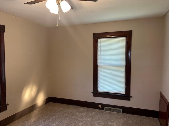 895 Cloud Rd, Salina, KS 67436 - unfurnished room featuring carpet flooring and ceiling fan