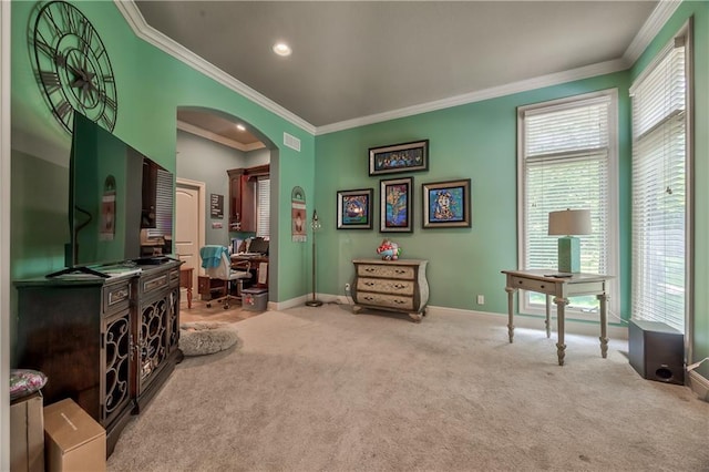 9638 Zarda Dr, Lenexa, KS 66227 - living area with arched walkways, healthy amount of natural light, crown molding, carpet flooring, and recessed lighting