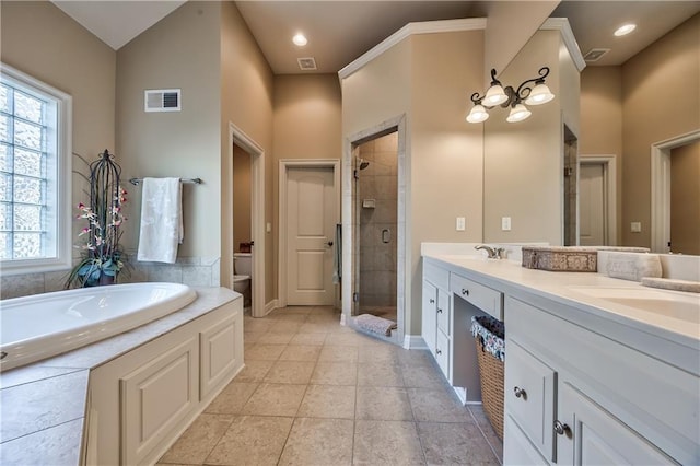 9638 Zarda Dr, Lenexa, KS 66227 - full bathroom with double vanity, a stall shower, and a garden tub