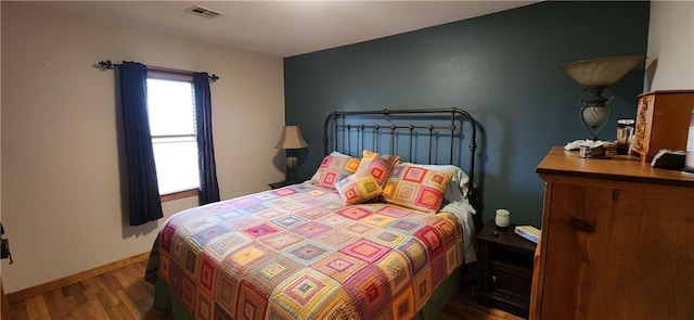 2104 County Road 4270, Independence, KS 67301 - bedroom with wood finished floors