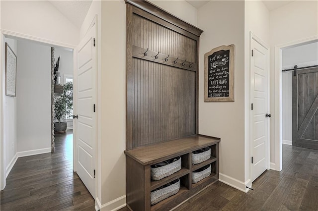 1527 SW Arbor Falls Dr, Lees Summit, MO 64082 - mudroom with a barn door, dark wood finished floors, and lofted ceiling