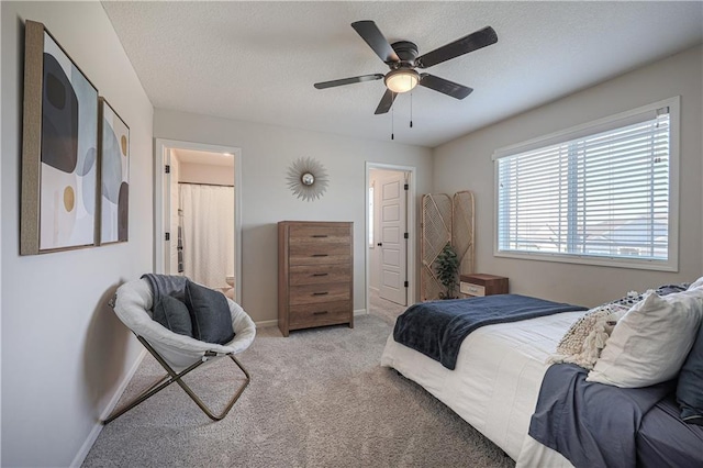 1527 SW Arbor Falls Dr, Lees Summit, MO 64082 - carpeted bedroom featuring a textured ceiling and ceiling fan