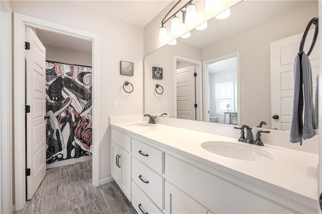 1527 SW Arbor Falls Dr, Lees Summit, MO 64082 - full bathroom featuring double vanity and wood finished floors