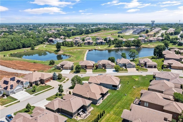 513 NE Wenonga Pl, Lees Summit, MO 64064 - aerial view of residential area with a large body of water