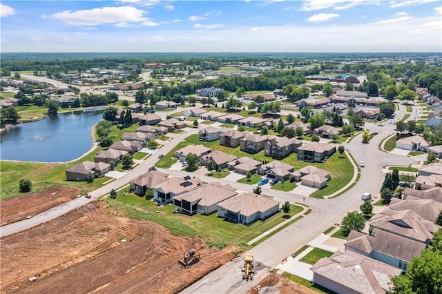 513 NE Wenonga Pl, Lees Summit, MO 64064 - aerial perspective of suburban area with a nearby body of water