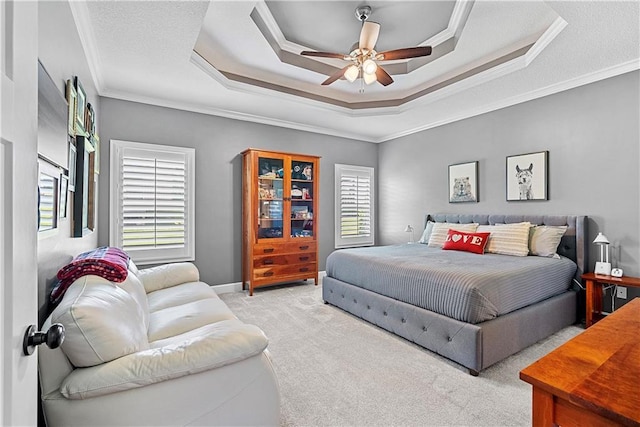 513 NE Wenonga Pl, Lees Summit, MO 64064 - carpeted bedroom with a tray ceiling, ornamental molding, and ceiling fan