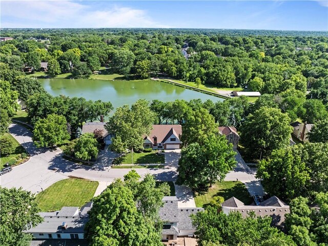 13109 W 65th St, Shawnee, KS 66216 - aerial view of property and surrounding area featuring a heavily wooded area and a nearby body of water