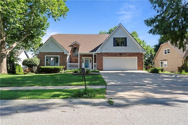 13109 W 65th St, Shawnee, KS 66216 - view of front of home with concrete driveway, brick siding, and a front lawn
