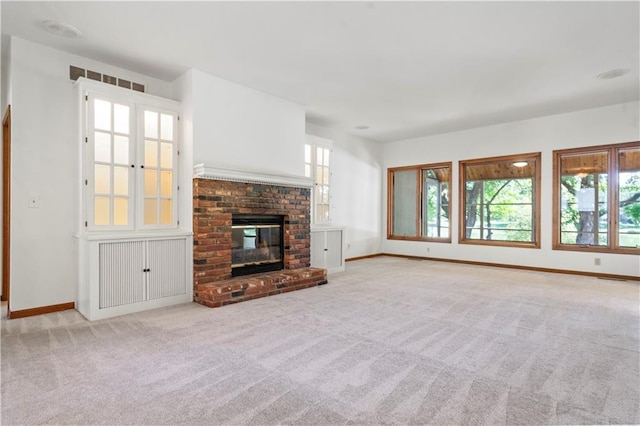 13109 W 65th St, Shawnee, KS 66216 - unfurnished living room with carpet floors and a brick fireplace