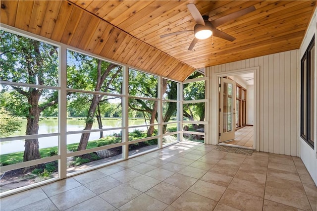 13109 W 65th St, Shawnee, KS 66216 - unfurnished sunroom with a water view, a ceiling fan, wooden ceiling, view of wooded area, and vaulted ceiling