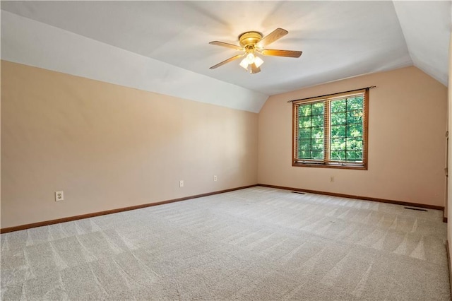 13109 W 65th St, Shawnee, KS 66216 - additional living space featuring vaulted ceiling, light carpet, and a ceiling fan