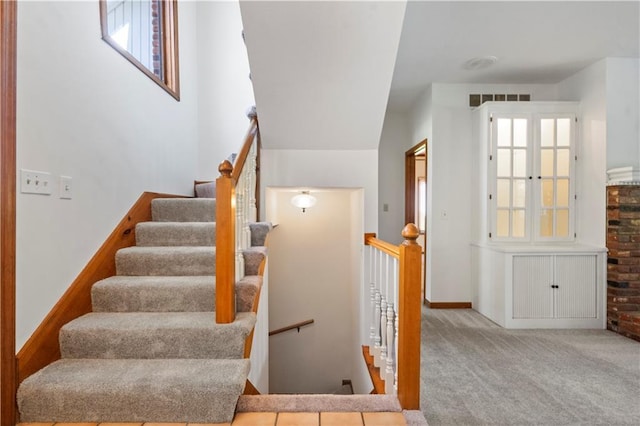 13109 W 65th St, Shawnee, KS 66216 - staircase featuring carpet flooring