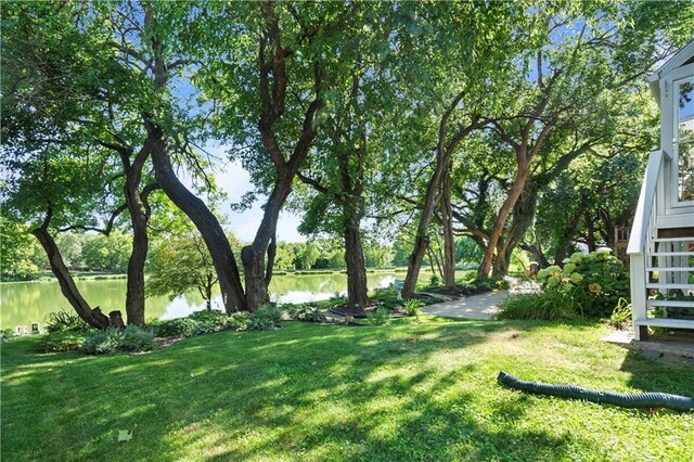 13109 W 65th St, Shawnee, KS 66216 - view of grassy yard featuring a water view and stairway