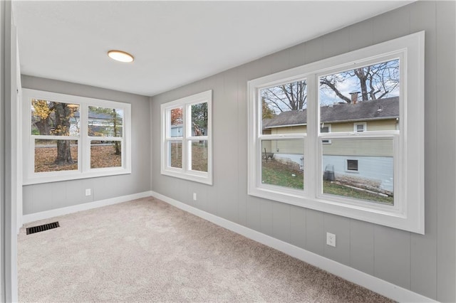 320 N Cedar Ave, Independence, MO 64053 - unfurnished sunroom featuring plenty of natural light