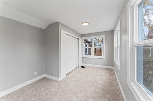 320 N Cedar Ave, Independence, MO 64053 - unfurnished bedroom with light carpet and a closet