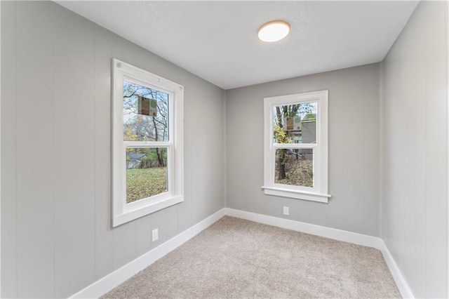 320 N Cedar Ave, Independence, MO 64053 - carpeted spare room with plenty of natural light
