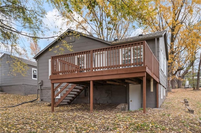 320 N Cedar Ave, Independence, MO 64053 - rear view of house with a deck and stairs