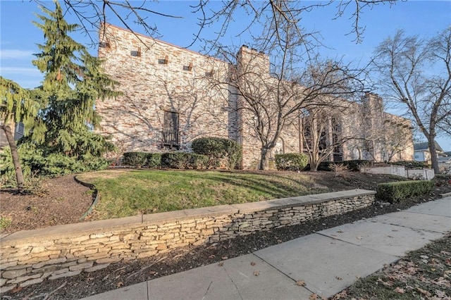 5015 Walnut St Unit A, Kansas City, MO 64112 - view of property's community with a lawn