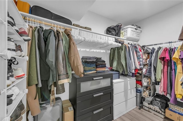 5015 Walnut St Unit A, Kansas City, MO 64112 - walk in closet with light wood finished floors
