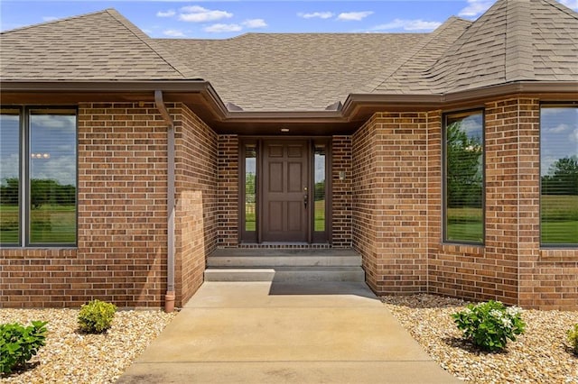 1001 E Park Rd, Garnett, KS 66032 - entrance to property with brick siding and a shingled roof