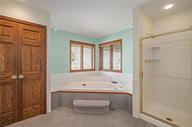 1001 E Park Rd, Garnett, KS 66032 - full bath with a garden tub and a stall shower