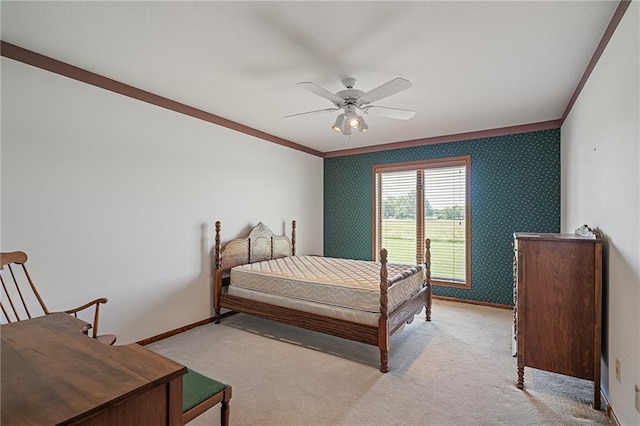 1001 E Park Rd, Garnett, KS 66032 - bedroom featuring light carpet, crown molding, ceiling fan, and wallpapered walls