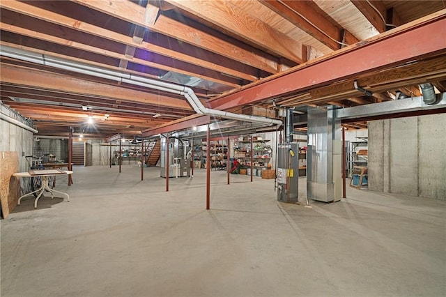 1001 E Park Rd, Garnett, KS 66032 - unfinished below grade area with heating unit and gas water heater
