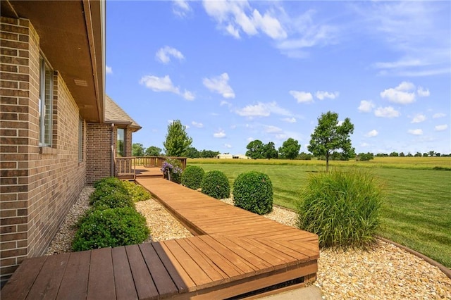 1001 E Park Rd, Garnett, KS 66032 - wooden deck with a lawn and a rural view
