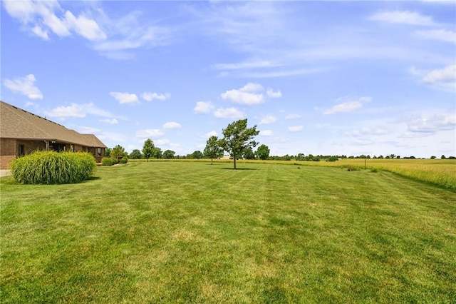 1001 E Park Rd, Garnett, KS 66032 - view of green lawn featuring a view of rural / pastoral area