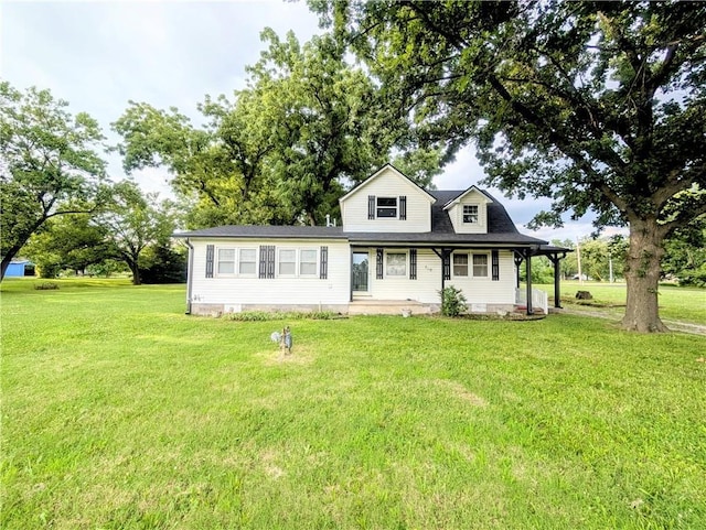 710 E Vine St, Iola, KS 66749 - view of front facade featuring a front lawn