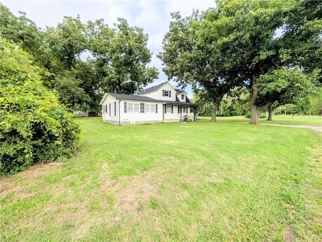 710 E Vine St, Iola, KS 66749 - view of front of home featuring a front lawn