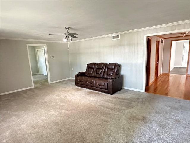 131 E Warren St, Gardner, KS 66030 - sitting room featuring ornamental molding, a ceiling fan, and carpet floors