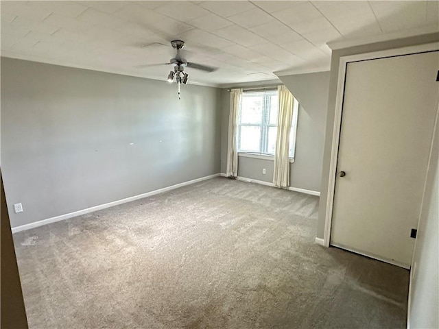 131 E Warren St, Gardner, KS 66030 - unfurnished bedroom with carpet, a closet, a ceiling fan, and crown molding