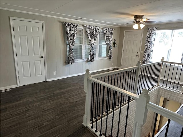 131 E Warren St, Gardner, KS 66030 - entryway with wood finished floors, ceiling fan, and ornamental molding