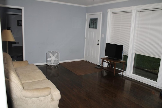 4301 James Ave, Independence, MO 64055 - living room featuring wood finished floors and ornamental molding