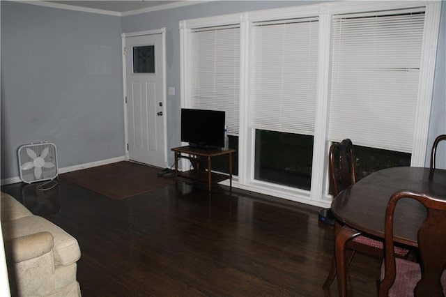 4301 James Ave, Independence, MO 64055 - living room featuring wood finished floors and crown molding