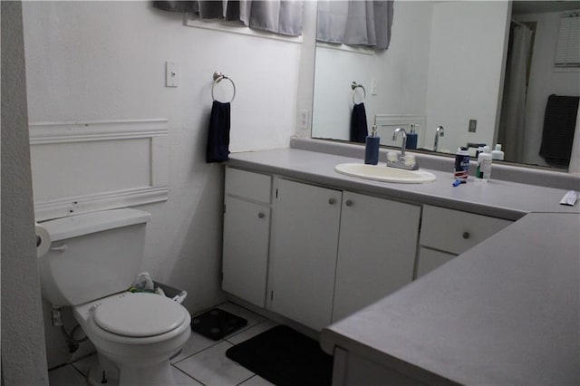 4301 James Ave, Independence, MO 64055 - full bath with tile patterned floors and vanity