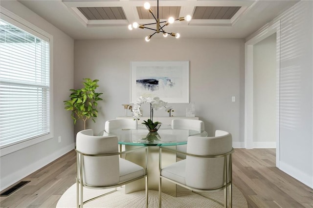16941 S Brentwood St, Olathe, KS 66062 - dining room with a chandelier and light wood-style floors