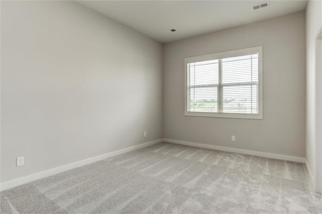 16941 S Brentwood St, Olathe, KS 66062 - spare room featuring light carpet and baseboards